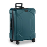 Briggs & Riley Torq medium spinner suitcase in stealth black with four wheels and a durable hard shell exterior.