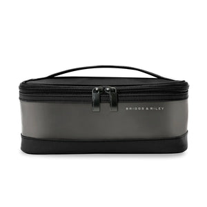 Briggs & Riley Translucent Essentials Case toiletry bag with clear plastic exterior and zipper closure, compact travel organizer.