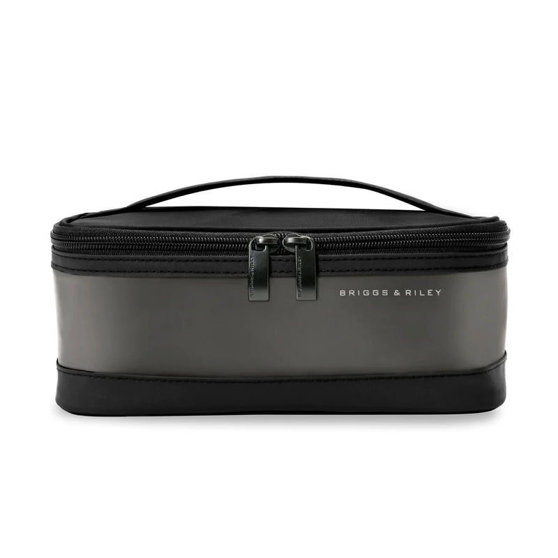 Briggs & Riley Translucent Essentials Case toiletry bag with clear plastic exterior and zipper closure, compact travel organizer.