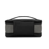 Briggs & Riley Translucent Essentials Case toiletry bag with clear exterior and multiple compartments for travel organization.