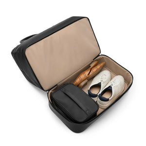 Interior view of Briggs & Riley Rhapsody Weekender Tote showing shoe compartment and spacious interior for travel essentials.