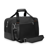 Briggs & Riley ZDX cabin tote bag with padded handles and multiple compartments, made of durable black nylon fabric.