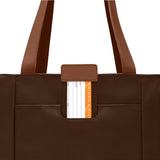 Briggs & Riley Baseline Traveler Tote in limited edition chocolate, featuring sturdy handles and spacious interior for travel essentials.