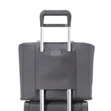 Briggs & Riley Baseline Traveler Tote in limited edition steel gray, showcasing a sleek, durable tote bag with multiple compartments.