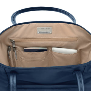 Interior view of Briggs & Riley Rhapsody expandable tote bag with multiple compartments and organized storage space.