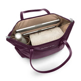 Interior view of Briggs & Riley Rhapsody expandable tote bag showing spacious main compartment and organized interior pockets.