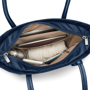 Briggs & Riley Rhapsody vertical tote bag interior showing multiple compartments and organization pockets for travel essentials.