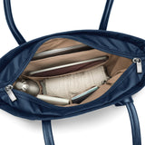 Briggs & Riley Rhapsody vertical tote bag interior showing multiple compartments and organization pockets for travel essentials.