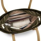 Interior view of the Briggs & Riley Rhapsody Vertical Tote bag showing spacious compartments and organized interior design.