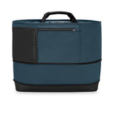 Briggs & Riley ZDX expandable overnighter tote bag with sturdy handles and sleek black design for travel and daily use.