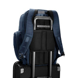 Briggs & Riley Baseline traveler backpack with passthrough luggage sleeve and multiple compartments for travel convenience.
