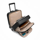 Black Briggs & Riley @work medium spinner briefcase with four wheels and telescoping handle, designed for business travel.