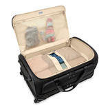 Briggs & Riley Baseline large two-wheel duffle bag with sturdy wheels and spacious main compartment for travel storage.