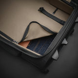 Briggs & Riley ZDX medium wheeled upright duffel with interior divider, black fabric, and sturdy wheels for travel.