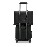 Black Briggs & Riley Rhapsody wheeled tote cabin bag with sturdy handles and four wheels, designed for travel convenience.