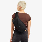 Chrome Mini Kadet Sling bag in sleek black with chrome accents, compact design, and adjustable strap for versatile carrying.