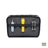 Chrome tensile sling bag in black with adjustable strap and multiple compartments, designed for durability and everyday use.
