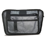 Chrome tensile sling bag interior showing multiple compartments and fabric details in a close-up shot.