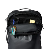Cotopaxi Allpa 28L travel backpack in black with multiple compartments and adjustable straps for durable, versatile travel use.