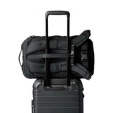 Black Cotopaxi Allpa 28L travel backpack with multiple compartments and padded straps, designed for versatile travel and adventure.