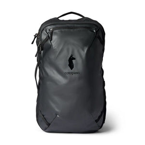 Cotopaxi Allpa 28L travel backpack in black, with multiple compartments and padded straps for comfortable travel.