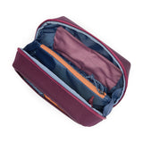 Cotopaxi Viaje Tech Organizer in black with multiple compartments for cables, chargers, and electronic accessories.