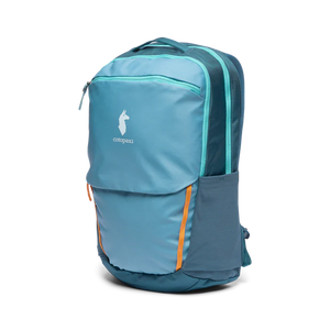 Cotopaxi Allpa 26L Daypack in blue spruce and abyss colors, featuring multiple compartments and adjustable straps for outdoor use.