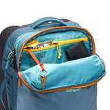 Cotopaxi Allpa 38L roller bag in Blue Spruce with carry-on size, durable carry-on luggage with wheels and a sturdy handle.