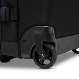 Cotopaxi 65L roller checked luggage bag with sturdy wheels and handle, designed for travel and easy maneuverability.