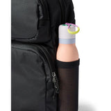 Cotopaxi Tasra 16L black backpack with multiple compartments and padded shoulder straps, designed for daily use and travel.