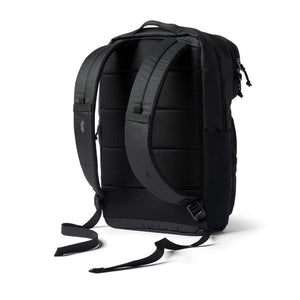 Cotopaxi Tasra 16L black backpack with multiple compartments and adjustable straps, designed for everyday use and outdoor activities.