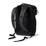 Cotopaxi Tasra 16L black backpack with multiple compartments and adjustable straps, designed for everyday use and outdoor activities.