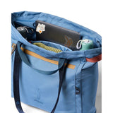 Cotopaxi Mente 22L Tote bag in Fjord color with durable fabric and spacious interior, perfect for daily use and travel.