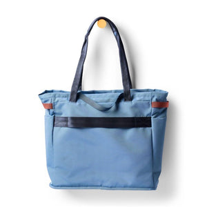 Cotopaxi Mente 22L Tote bag in Fjord color, showing its spacious fabric with sturdy handles and minimalist design.