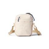 Cream Cotopaxi Todo 1L shoulder bag with adjustable strap and durable fabric, ideal for everyday carrying.