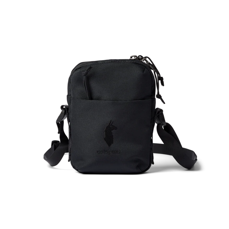 Cream Cotopaxi Todo 1L shoulder bag with adjustable strap and compact design, ideal for daily essentials and outdoor use.