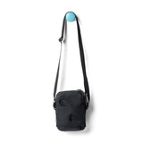 Cream Cotopaxi Todo 1L shoulder bag with adjustable strap, compact design, and durable material for everyday use.