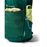 Cotopaxi Elqui 24L backpack in vibrant kale green with multiple compartments and adjustable straps.
