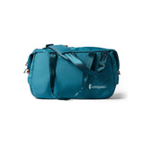 Cotopaxi Viaje 35L travel duffel bag in Blue Spruce with adjustable shoulder strap and spacious main compartment.