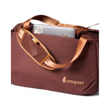 Cotopaxi Viaje 35L travel duffel bag in sepia color, showing the durable fabric and spacious design for travel storage.
