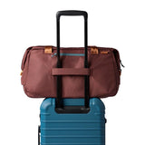 Cotopaxi Viaje 35L travel duffel bag in sepia color, durable fabric with zipper closure and carrying handles.