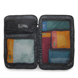 Cotopaxi Allpa 35L travel backpack in black with multiple compartments and sturdy straps, designed for versatile travel.