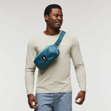 Cotopaxi Coso 2L Hip Pack waist pack in Abyss Coastal color, featuring adjustable strap and compact storage for daily use.