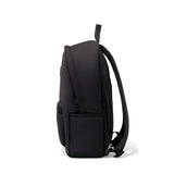 Dagne Dover Dakota Neoprene Backpack in Onyx, medium size, side view showing sleek black design and durable neoprene material.