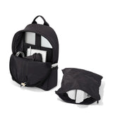 Dagne Dover Dakota Neoprene Medium Backpack in Onyx with top-down view, showcasing sleek black design and sturdy straps.