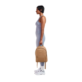 Dagne Dover Dakota medium neoprene backpack in camel color with adjustable straps and zippered compartments.