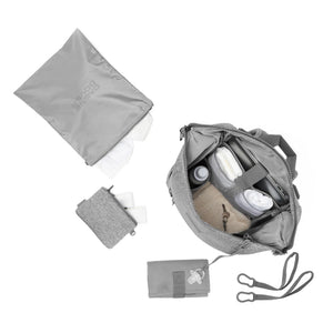 Dagne Dover Indi Neoprene Diaper Backpack in Heather Grey, large size, with top-down view showing multiple compartments and sleek design.