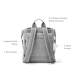 Dagne Dover Indi Neoprene Diaper Backpack in medium size, showing the sleek black design with multiple compartments and a mobile pocket.