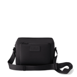 Black Dagne Dover Micah neoprene crossbody bag with adjustable strap and sleek design, ideal for everyday use