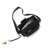 Dagne Dover Micah Neoprene Crossbody bag in onyx black, featuring adjustable strap and sleek modern design.